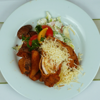 Rántott csirkemell mozzarella sajttal és pármai sonkával töltve